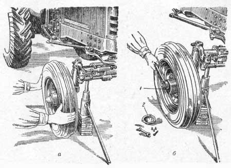 Проверка и регулировка осевого зазора в подшипниках переднего колеса всех тракторов, кроме МТЗ5Л и МТЗ7М
